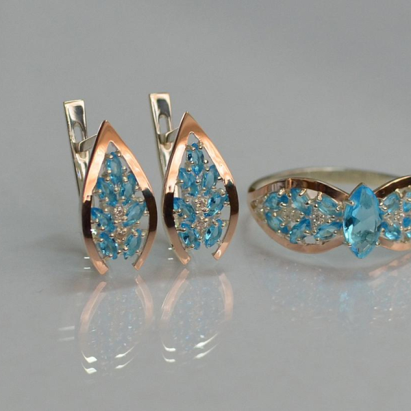 Срібний набір з золотими пластинами