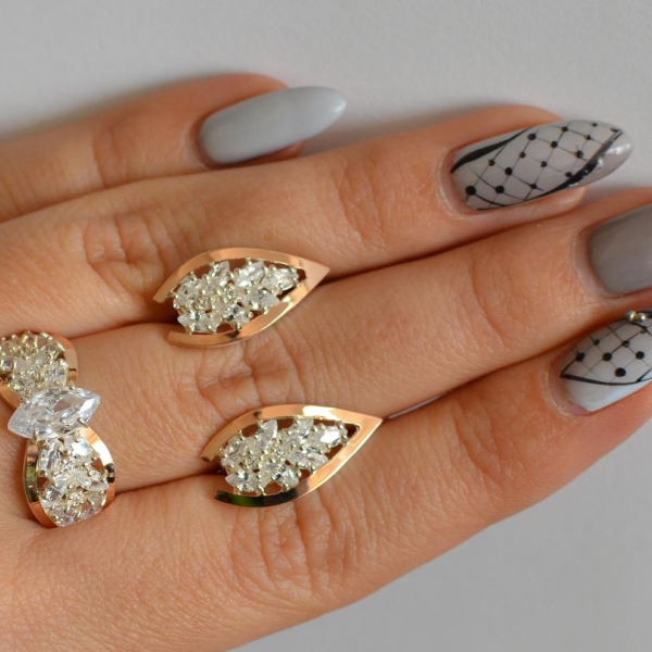 Срібний набір з золотими пластинами