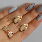 Срібний набір з золотими пластинами