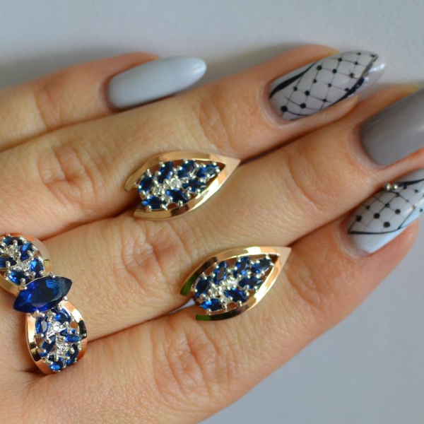 Срібний набір з золотими пластинами