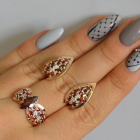 Срібний набір з золотими пластинами