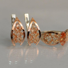 Срібний набір з золотими пластинами