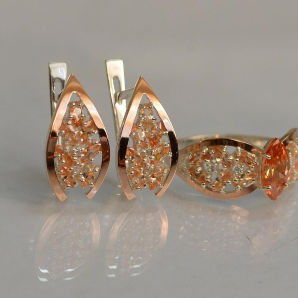 Срібний набір з золотими пластинами