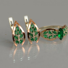 Срібний набір з золотими пластинами