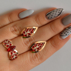 Срібний набір з золотими пластинами