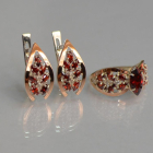 Срібний набір з золотими пластинами