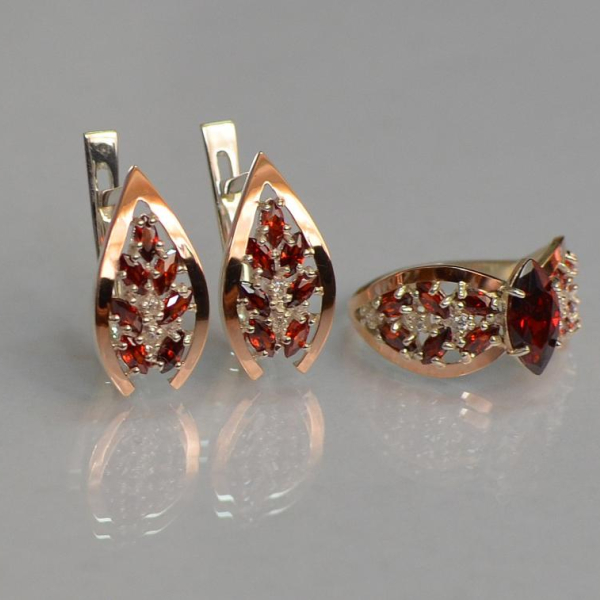 Срібний набір з золотими пластинами