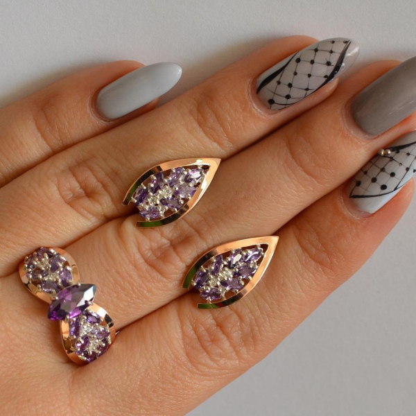 Срібний набір з золотими пластинами