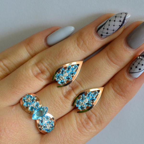 Срібний набір з золотими пластинами