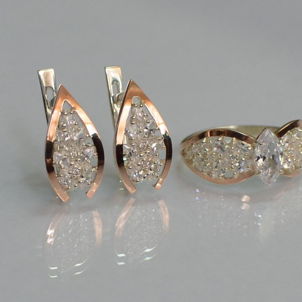 Срібний набір з золотими пластинами