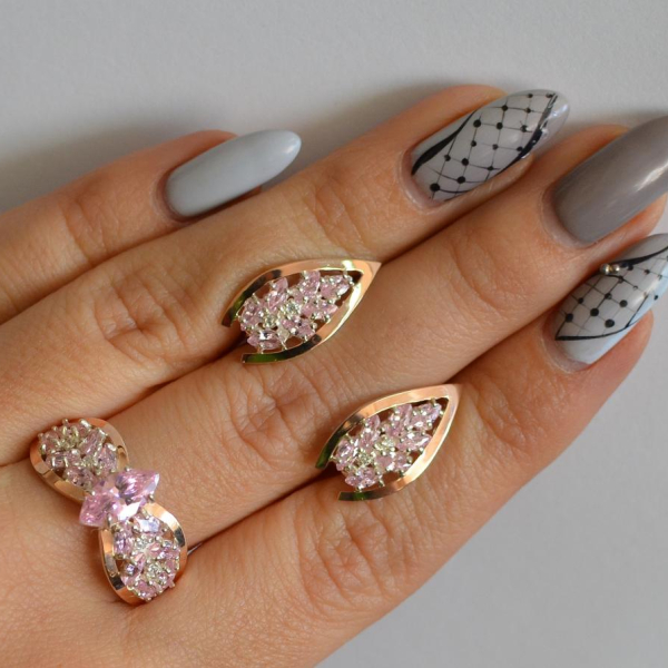 Срібний набір з золотими пластинами