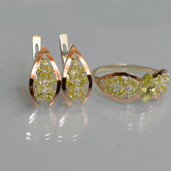 Срібний набір з золотими пластинами