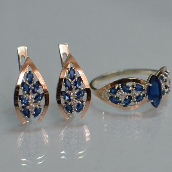 Срібний набір з золотими пластинами