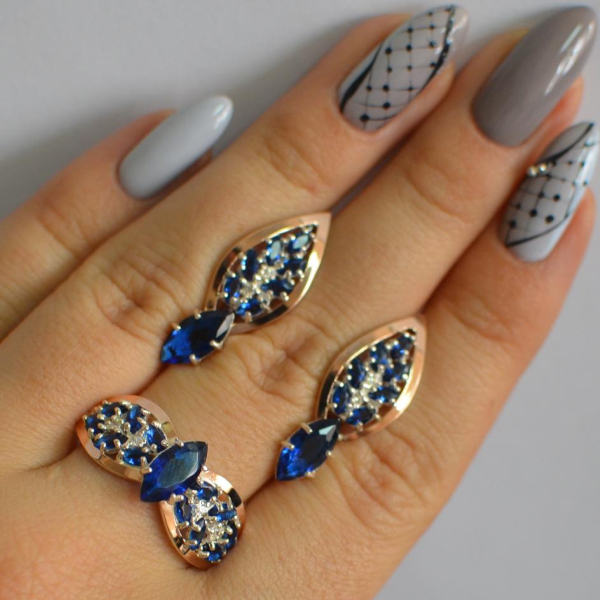 Срібний набір з золотими пластинами