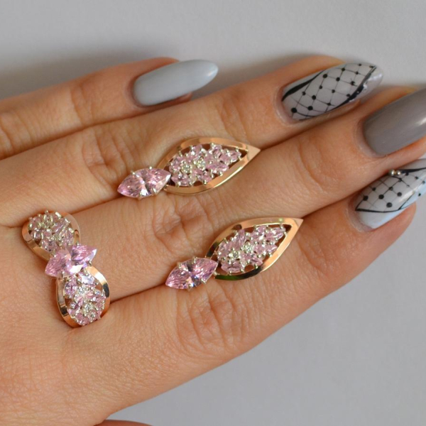 Срібний набір з золотими пластинами