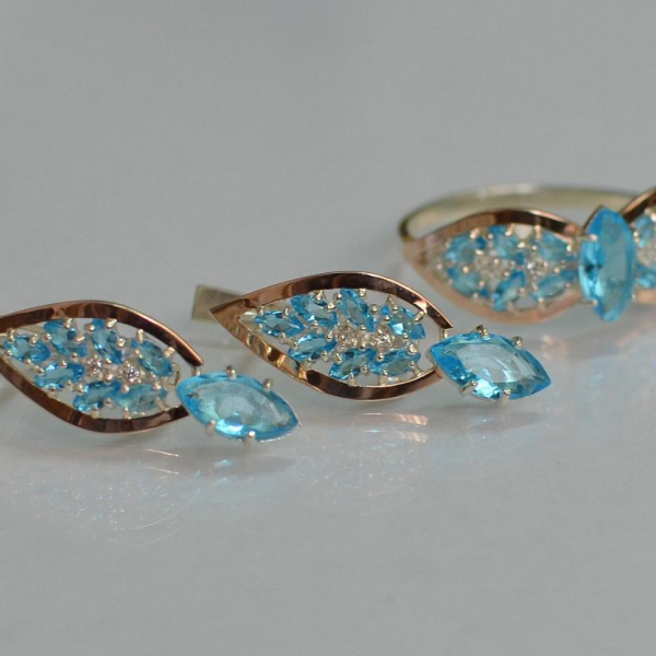 Срібний набір з золотими пластинами