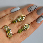 Срібний набір з золотими пластинами