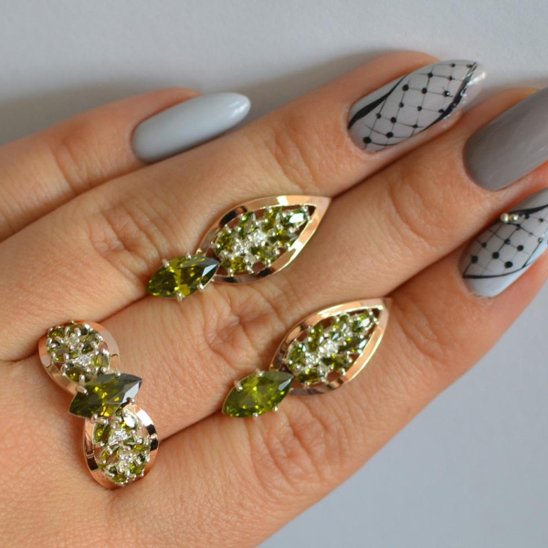 Срібний набір з золотими пластинами