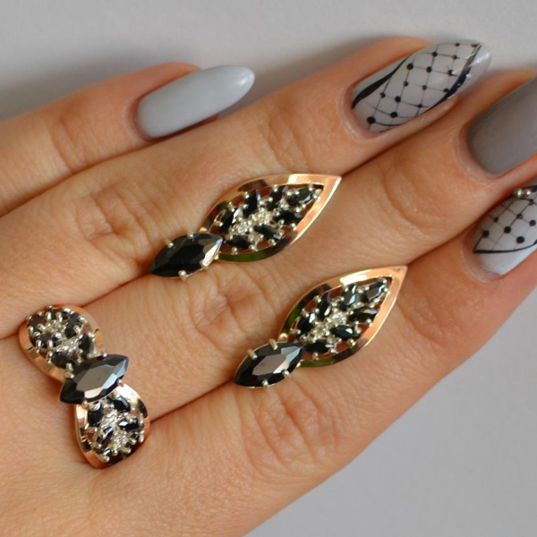 Срібний набір з золотими пластинами