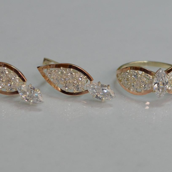 Срібний набір з золотими пластинами