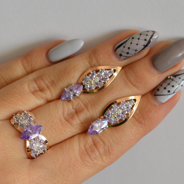 Срібний набір з золотими пластинами