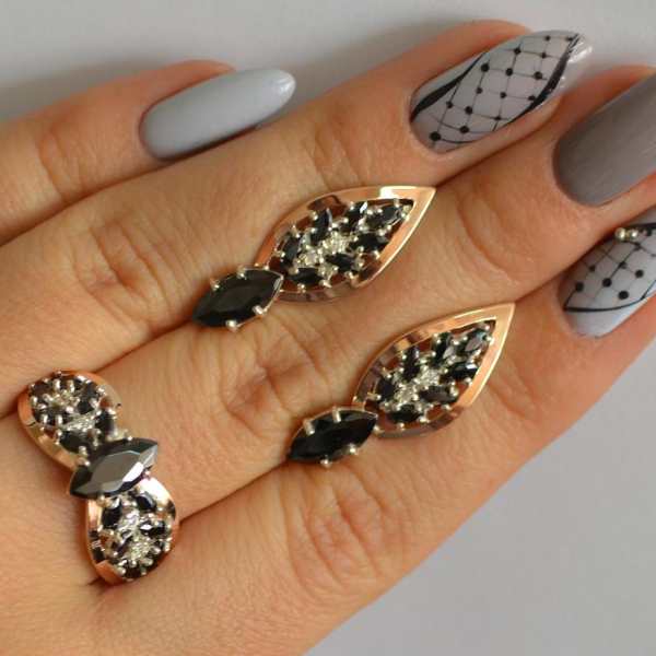 Срібний набір з золотими пластинами