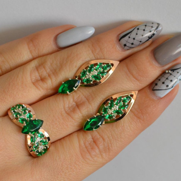 Срібний набір з золотими пластинами