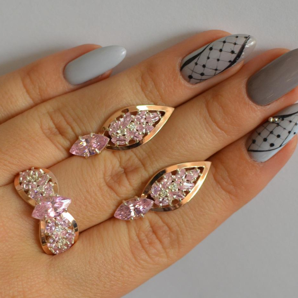 Срібний набір з золотими пластинами