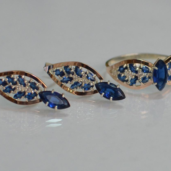 Срібний набір з золотими пластинами