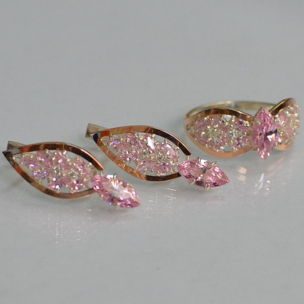 Срібний набір з золотими пластинами