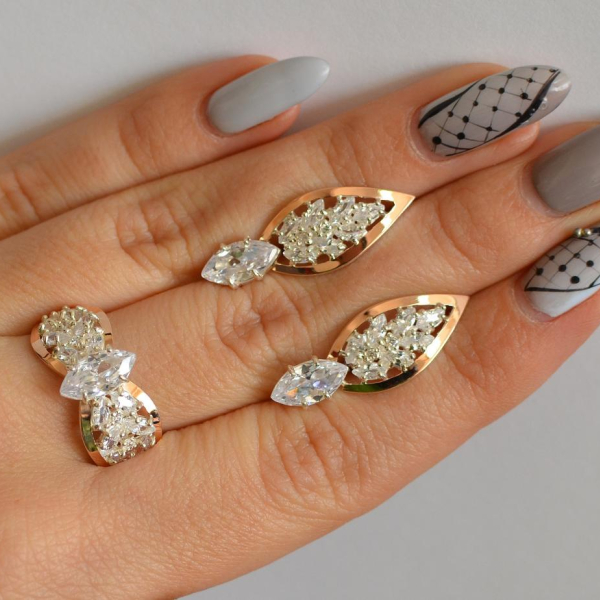 Срібний набір з золотими пластинами