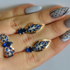 Срібний набір з золотими пластинами