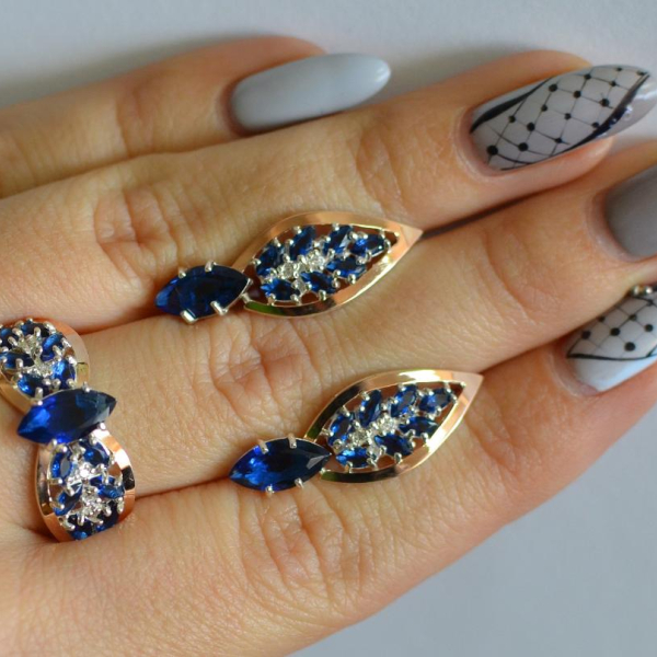 Срібний набір з золотими пластинами