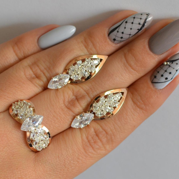 Срібний набір з золотими пластинами