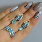 Срібний набір з золотими пластинами