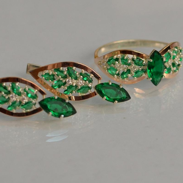 Срібний набір з золотими пластинами