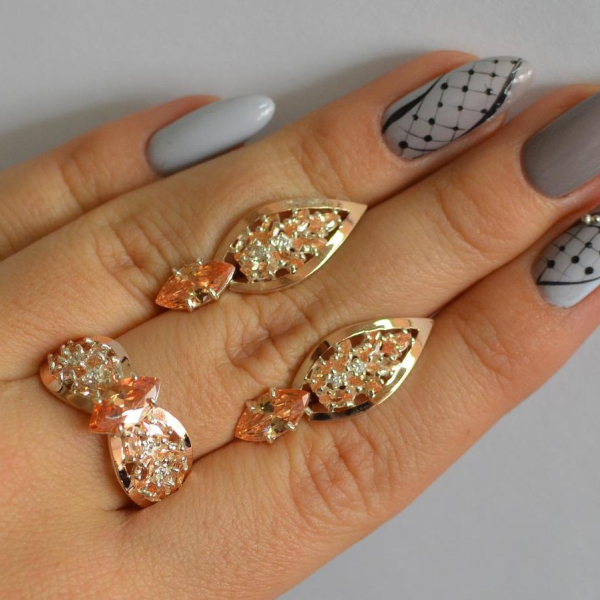 Срібний набір з золотими пластинами