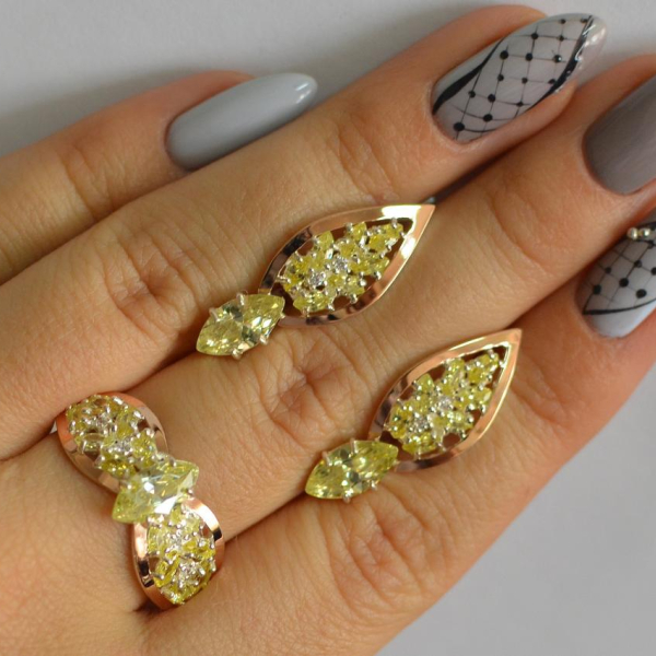 Срібний набір з золотими пластинами