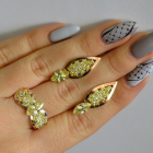 Срібний набір з золотими пластинами