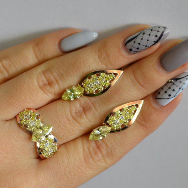 Срібний набір з золотими пластинами