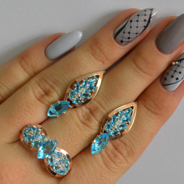 Срібний набір з золотими пластинами