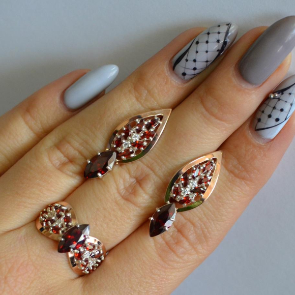 Срібний набір з золотими пластинами