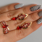 Срібний набір з золотими пластинами