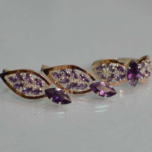 Срібний набір з золотими пластинами