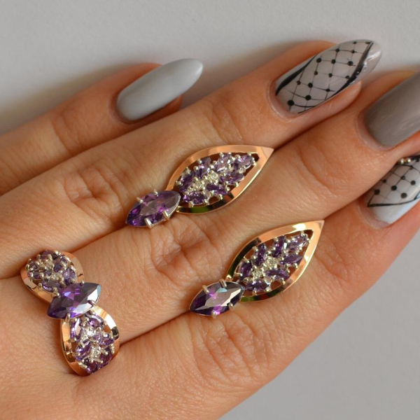 Срібний набір з золотими пластинами