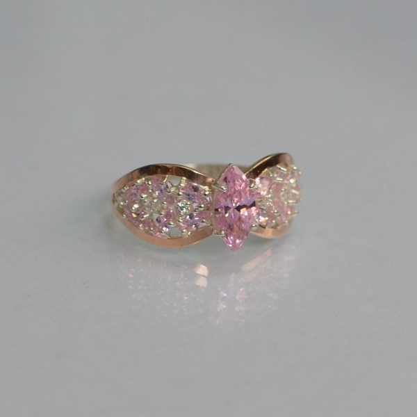 Срібна каблучка з золотими вставками