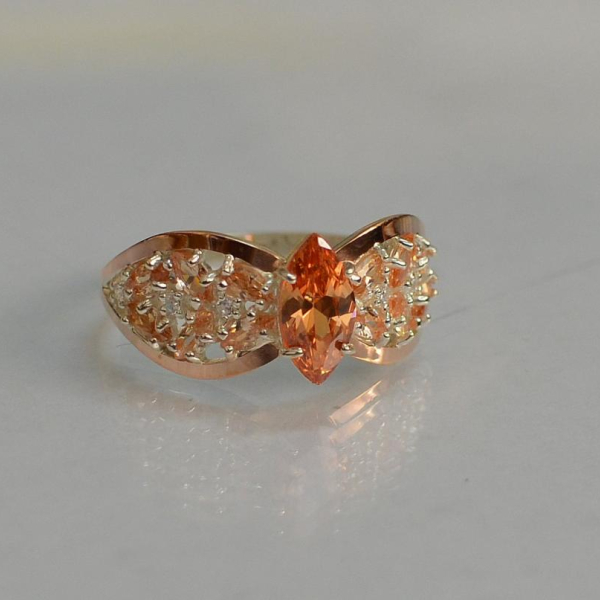 Срібна каблучка з золотими вставками