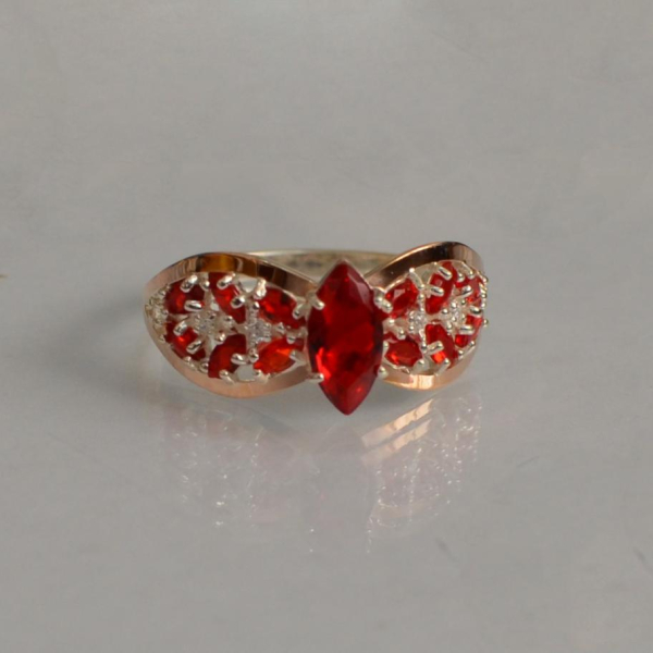 Срібна каблучка з золотими вставками