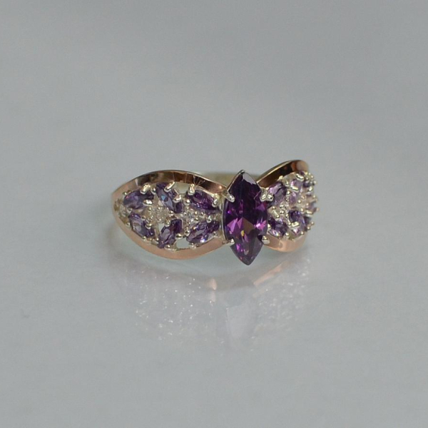 Срібна каблучка з золотими вставками