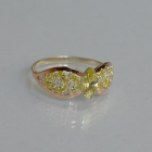 Срібна каблучка з золотими вставками